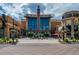 Exterior view of Hollywood Theater, featuring a large glass facade and modern architectural design at 3311 E Euclid Ave, Centennial, CO 80121