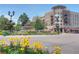 Scenic view of the Southglenn fountain and complex with yellow flowers at 3311 E Euclid Ave, Centennial, CO 80121