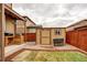Backyard shed and patio with custom wood barbecue station at 25046 E Bayaud Pl, Aurora, CO 80018