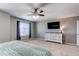 Another view of spacious bedroom with ceiling fan and dark curtains at 25046 E Bayaud Pl, Aurora, CO 80018