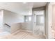 Upstairs loft area with carpet, window, and doorway into a bedroom at 25046 E Bayaud Pl, Aurora, CO 80018