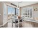 Charming dining area with hardwood floors and patio access at 1705 Peridot Ct, Castle Rock, CO 80108