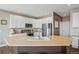 Modern kitchen with stainless steel appliances and ample cabinetry at 1705 Peridot Ct, Castle Rock, CO 80108