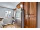 Close up of the updated kitchen featuring stainless steel appliances and granite countertops at 12682 Fairfax St, Thornton, CO 80241