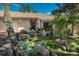 Landscaped front yard with boulders and mature Aspen trees at 947 Dogwood Dr, Golden, CO 80401