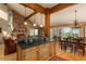 Kitchen island open to the dining area, next to the fireplace at 947 Dogwood Dr, Golden, CO 80401