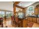 Kitchen with breakfast bar, granite countertops, stainless appliances, and views at 947 Dogwood Dr, Golden, CO 80401