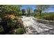 Beautifully landscaped garden area with lush greenery, vibrant flowers, and shaded seating at 3100 E Cherry Creek South Dr # 1101, Denver, CO 80209