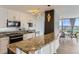 Updated kitchen features granite countertops, stainless steel appliances, and ample cabinet space at 3100 E Cherry Creek South Dr # 1101, Denver, CO 80209