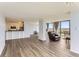 Open-concept living space with hardwood floors, city views, and modern finishes at 3100 E Cherry Creek South Dr # 1101, Denver, CO 80209