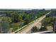 Beautiful window view of a road, stream, and nature at 3100 E Cherry Creek South Dr # 1101, Denver, CO 80209