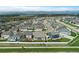 Aerial view of a suburban neighborhood showcasing the surrounding community and landscape at 2200 Cadman St, Berthoud, CO 80513