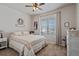 Comfortable bedroom featuring a large window and neutral decor at 2200 Cadman St, Berthoud, CO 80513