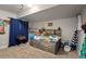 ' bedroom with a wooden bed, drumset, and playful decor at 2200 Cadman St, Berthoud, CO 80513