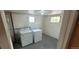 Utility room with a full size washer and dryer at 9120 Elm Ct, Denver, CO 80260