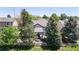 Backyard with mature trees and a cozy patio area at 20855 Omaha Ave, Parker, CO 80138