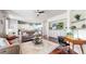 Open living space with hardwood flooring and designated home office space at 20855 Omaha Ave, Parker, CO 80138