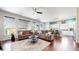 Spacious living room area features comfortable seating and connects to a modern kitchen at 20855 Omaha Ave, Parker, CO 80138