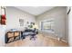 Bright home office with a large window providing ample natural light and comfortable workspace at 20855 Omaha Ave, Parker, CO 80138