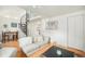 Open living space with spiral staircase and natural light at 3726 Decatur St, Denver, CO 80211