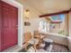Inviting front porch with seating area and a bright, welcoming entrance at 3726 Decatur St, Denver, CO 80211