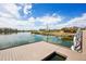 Lakeside pier and deck area with scenic water views, offering a relaxing community space at 12797 Clearview St, Firestone, CO 80504