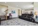 Open floor plan with living room, hardwood floors, and staircase leading to the second floor at 12797 Clearview St, Firestone, CO 80504