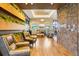 Inviting lobby with comfortable seating, wood accents, and stylish design elements at 12797 Clearview St, Firestone, CO 80504