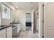 En suite bath features granite counters, dual sinks and open access to main bedroom at 12797 Clearview St, Firestone, CO 80504
