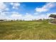 Expansive grassy lawn, perfect for community events or recreational activities at 12797 Clearview St, Firestone, CO 80504