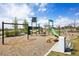 Community playground with swings, slides, and climbing structures for children to enjoy at 12797 Clearview St, Firestone, CO 80504