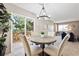 Elegant dining area with sliding glass doors and natural light at 1001 W 112Th Ave # D, Westminster, CO 80234