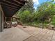 Open patio with stone landscaping and comfortable seating is perfect for enjoying the outdoors at 1075 Dudley St, Lakewood, CO 80215