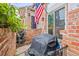 Brick patio with grill, perfect for outdoor cooking and entertaining at 15149 E Princeton Pl # B, Aurora, CO 80014