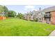 Row of well-maintained townhomes with manicured green lawn at 15149 E Princeton Pl # B, Aurora, CO 80014