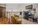 Cozy hallway featuring a comfortable chair and an office space at 15149 E Princeton Pl # B, Aurora, CO 80014