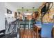 Open kitchen with granite countertops and a view to the dining room and living room fireplace at 15149 E Princeton Pl # B, Aurora, CO 80014
