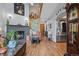 Spacious living room with fireplace and open staircase at 15149 E Princeton Pl # B, Aurora, CO 80014