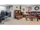 Spacious basement living room with a large sectional couch and entertainment area at 15149 E Princeton Pl # B, Aurora, CO 80014