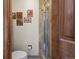Stylish shower area with ceramic tile and glass door at 15149 E Princeton Pl # B, Aurora, CO 80014