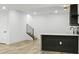 An unfinished basement with an egress and roughed-in plumbing offers potential for customization at 995 Pinehurst Ct, Bennett, CO 80102