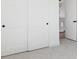 Bedroom closet with sliding doors and modern hardware at 995 Pinehurst Ct, Bennett, CO 80102