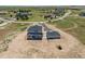 Exterior overhead view of a new construction home with a three car garage in a quiet community at 995 Pinehurst Ct, Bennett, CO 80102