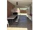 Relax under this home's covered patio, perfect for outdoor dining and entertainment at 1516 S Lowell Blvd, Denver, CO 80219