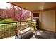 Outdoor balcony with a barbecue grill and seating area perfect for entertaining at 303 Inverness S Way # 101, Englewood, CO 80112