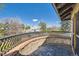 Private balcony features brick flooring and railing with views of the surrounding neighborhood at 680 N Emerson St, Denver, CO 80218