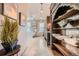 Luxurious bathroom featuring a unique wood shelving and spacious, bright design at 680 N Emerson St, Denver, CO 80218