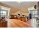 Bonus room featuring hardwood floors, lots of space and natural light from the windows at 680 N Emerson St, Denver, CO 80218