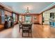 Formal dining room with hardwood floors, a chandelier and adjoining room at 680 N Emerson St, Denver, CO 80218