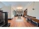 Elegant foyer with hardwood floors, decorative molding and a staircase at 680 N Emerson St, Denver, CO 80218